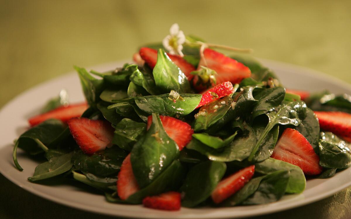 Spinach and strawberry salad with thyme-infused vinaigrette