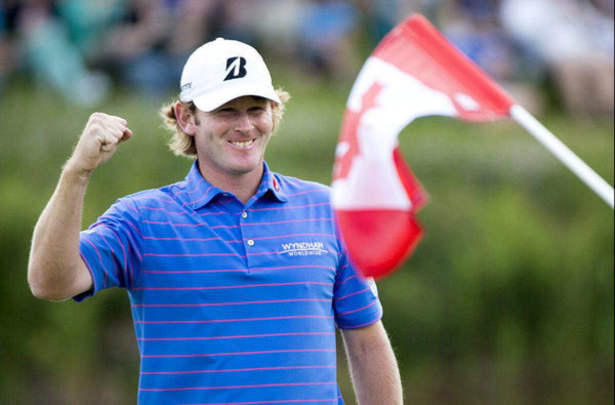 Brandt Snedeker celebrates after clinching a victory in the Canadian Open at Glen Abbey Golf Club on Sunday.
