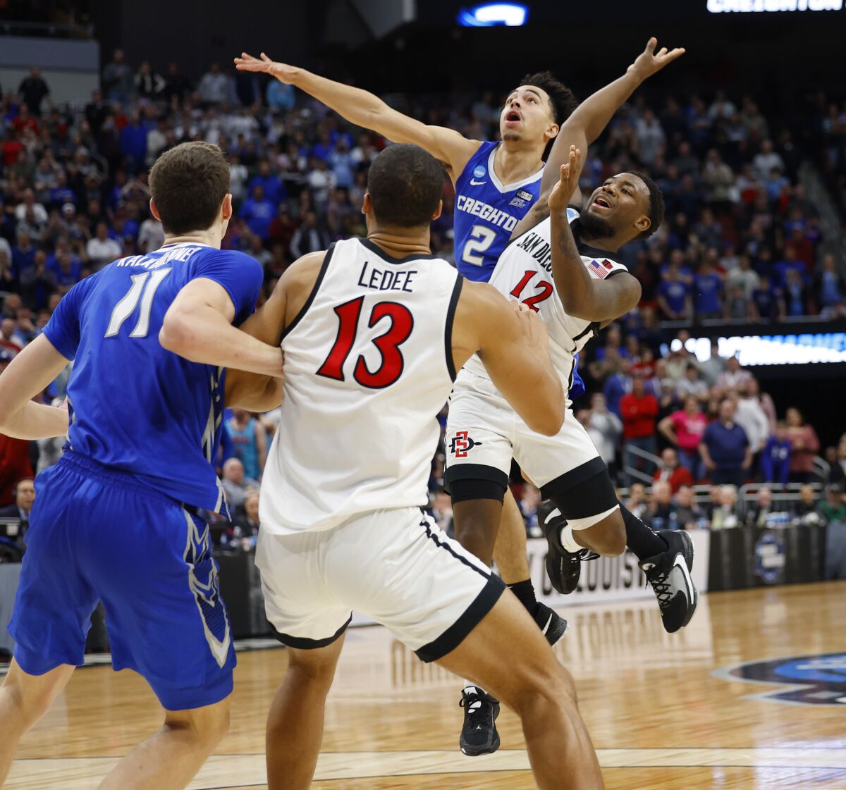 SDSU's Darrion Trammell is fouled by Creighton's Ryan Nembhard to set up game-winning free throw in a 57-56 victory.