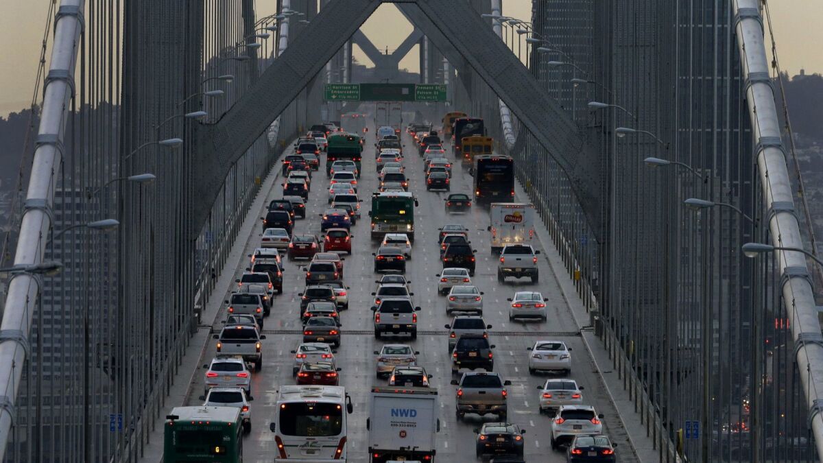 Vehicles travel west on Interstate 80 across the San Francisco-Oakland Bay Bridge in 2015.