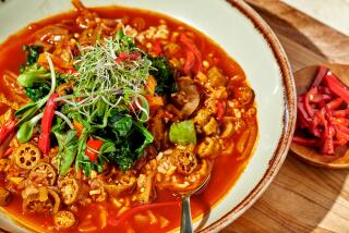 Chef Keith Corbin's vegetarian gumbo, in a bowl on a wooden surface.