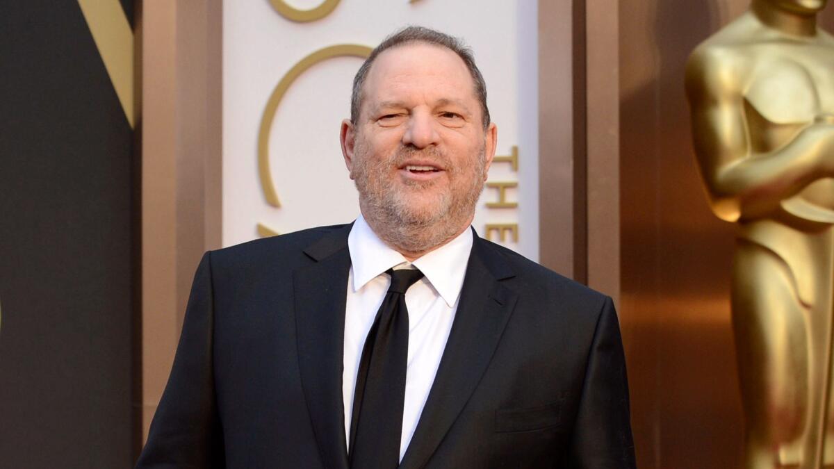 Harvey Weinstein, shown arriving at the Dolby Theatre in Los Angeles for the Academy Awards in 2014, has resigned his membership to the DGA as the scandal surrounding his alleged acts of sexual misconduct continues to grow.