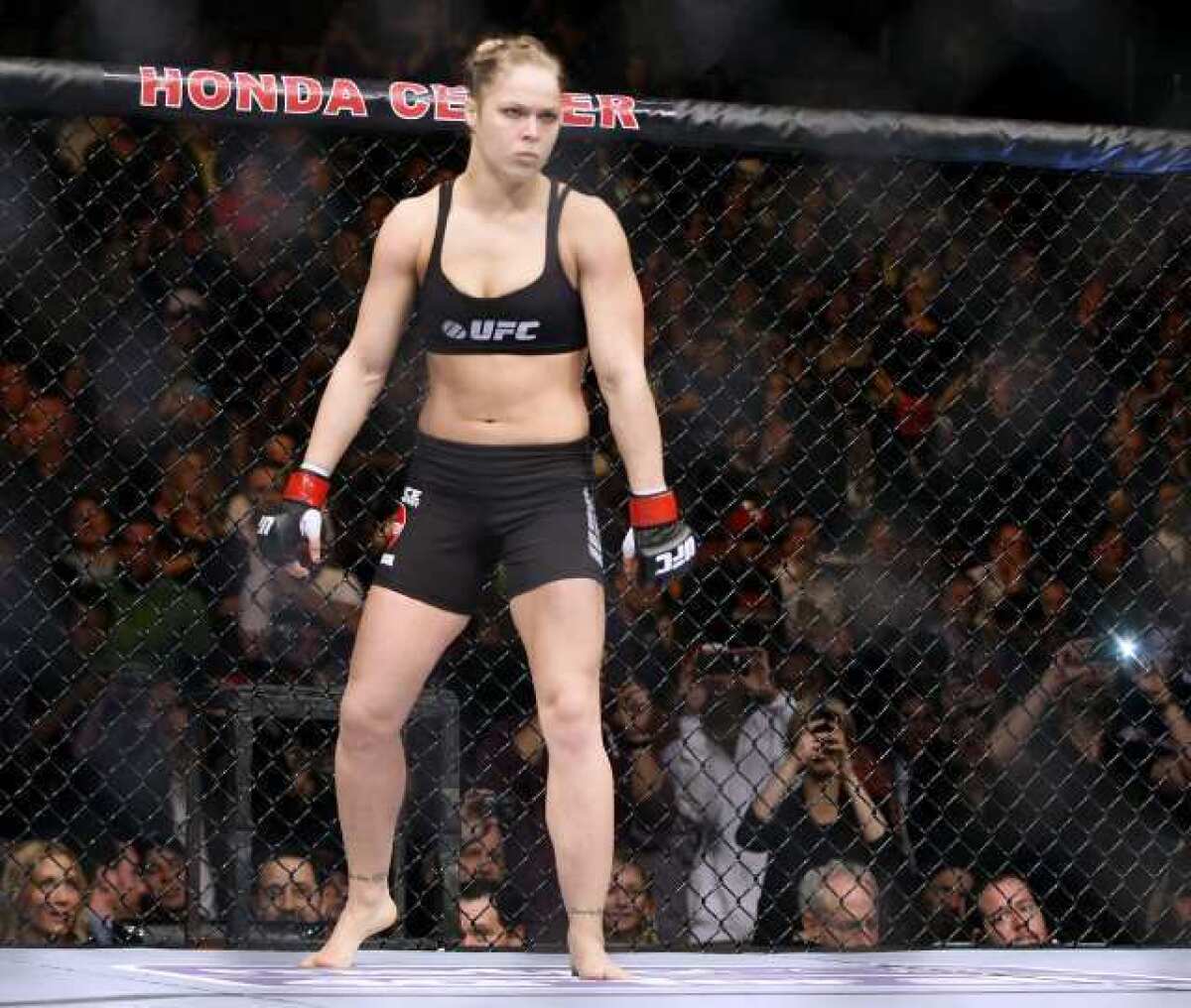 ARCHIVE PHOTO: Ronda Rousey will put her Ultimate Fighting Championship women¿s bantamweight title on the line against Cat Zingano sometime ¿at the end of the year."