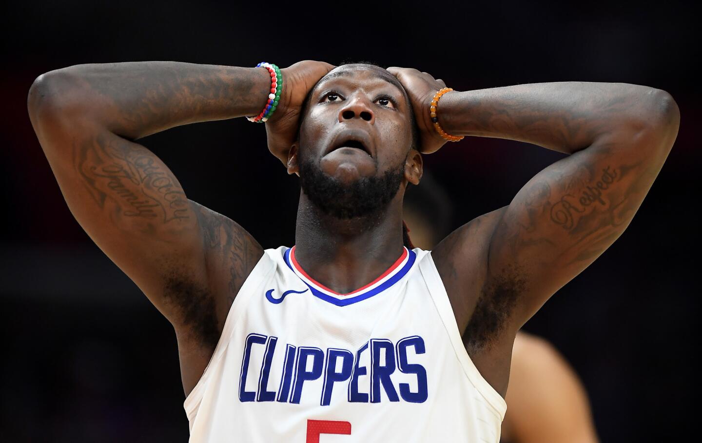 Clippers forward Montrezl Harrell walks down court after being called for a foul against the TImberwolves late in the fourth quarter.