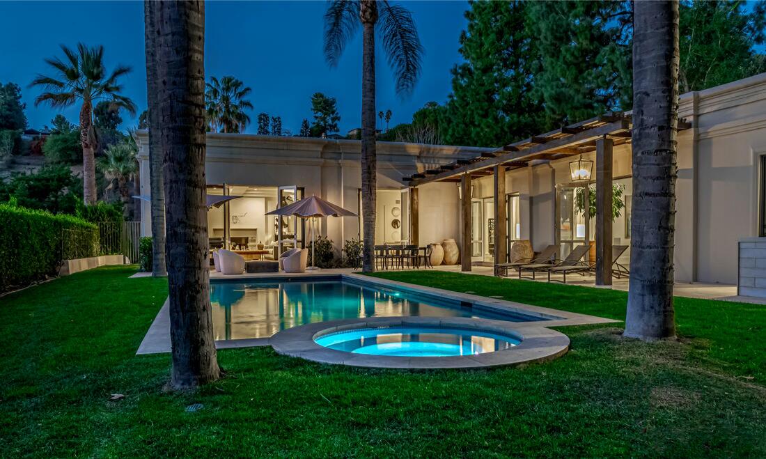 The half-acre estate includes a 5,500-square-foot villa, a swimming pool and a guesthouse that's currently under construction.