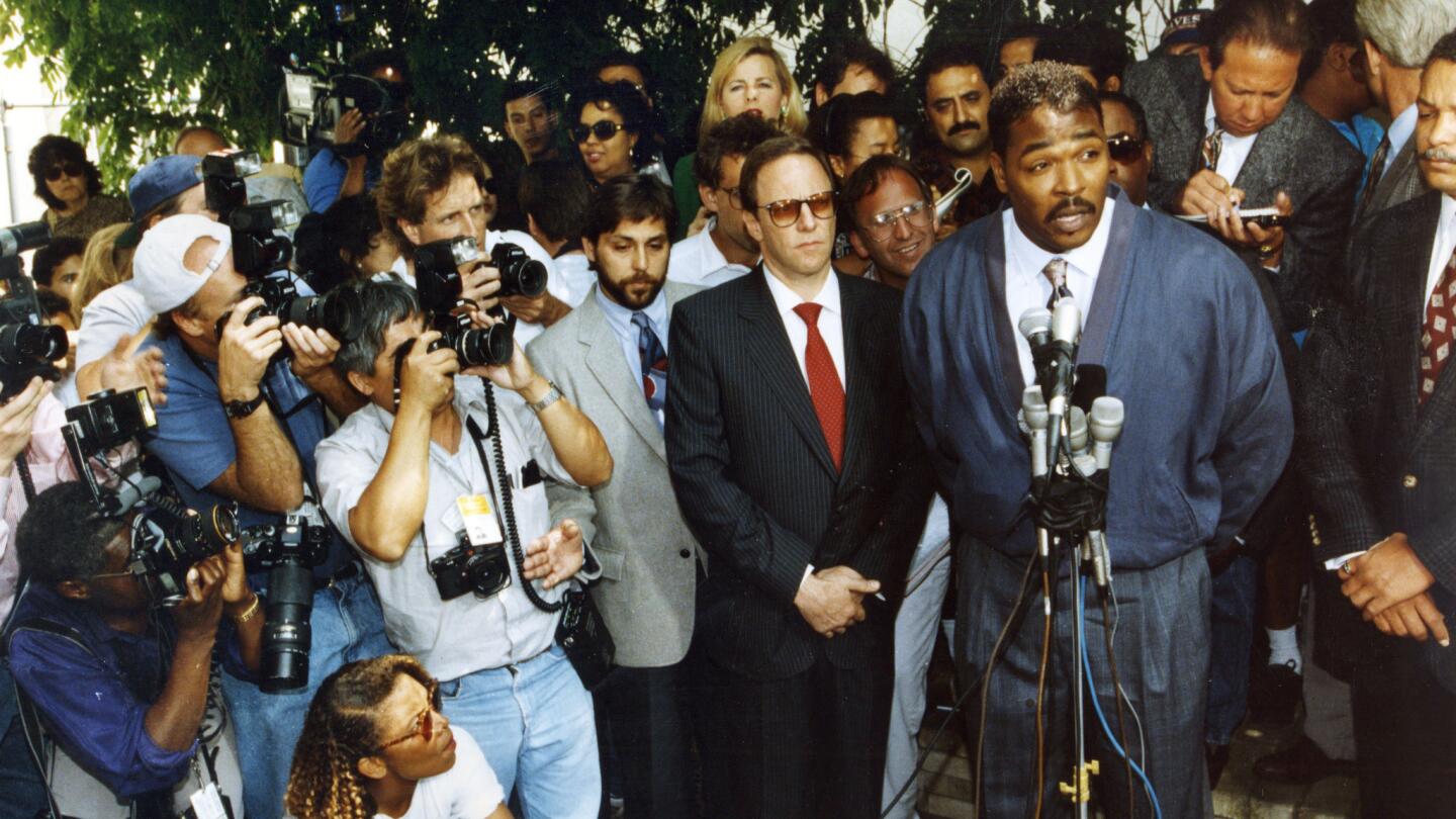Rodney King, speaking to the media outside of his lawyer's office in Beverly Hills on May 1, 1992, asks for an end to the killing, looting and destruction that his case against the LAPD caused.