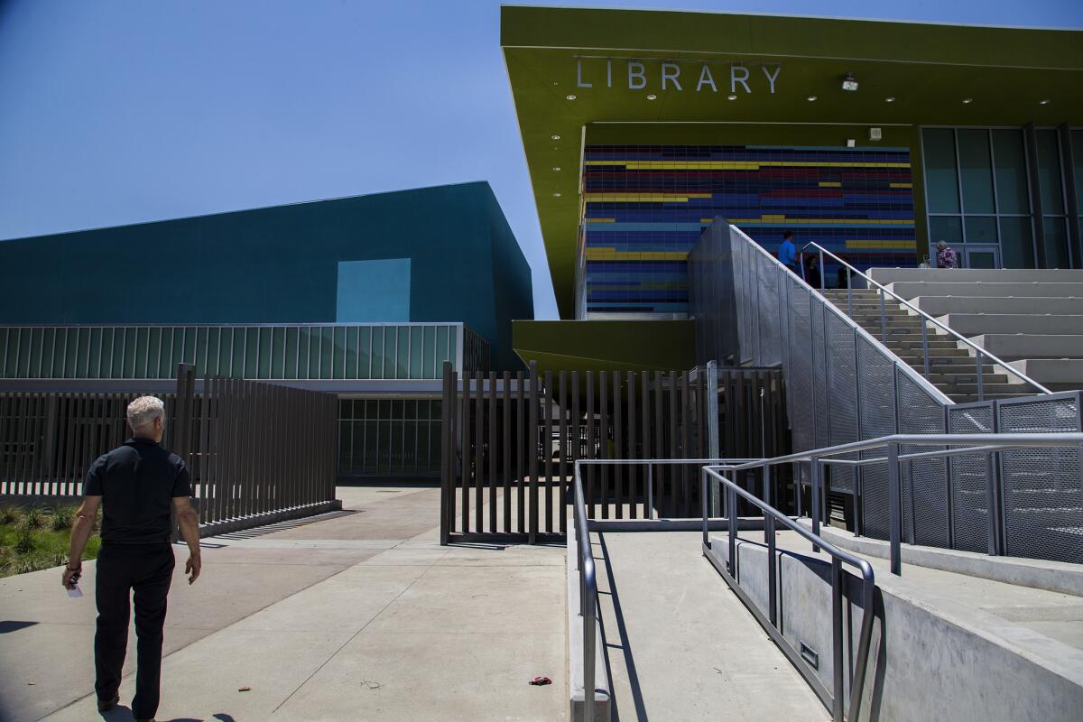 Architect Ben Levin of DLR Group walks through the new Maywood campus, which opens Tuesday. (Gina Ferazzi / Los Angeles Times)
