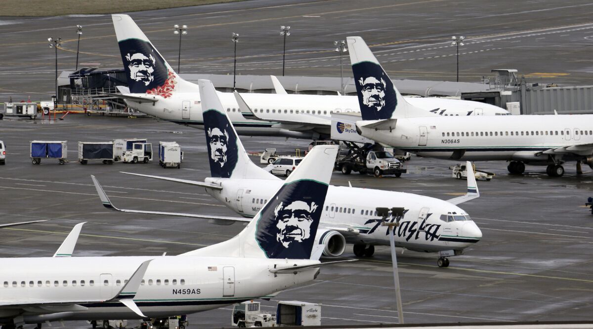 Alaska Airlines jets at Seattle-Tacoma International Airport.
