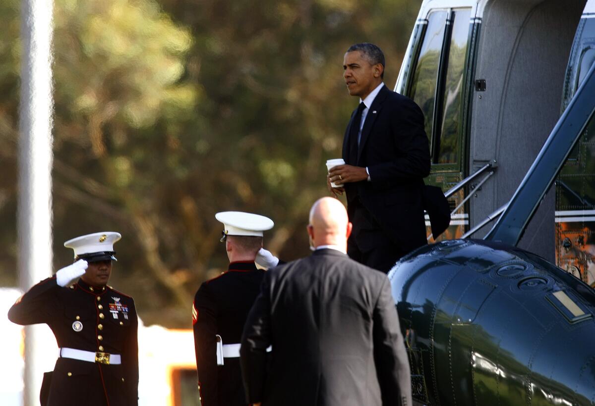 President Obama exits Marine One at Chevoit Hills Park before attending events in Los Angeles on May 7.