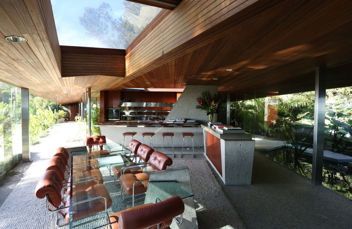 The kitchen and dining area of homeowner Jim Goldstein's John Lautner house in Beverly Crest.