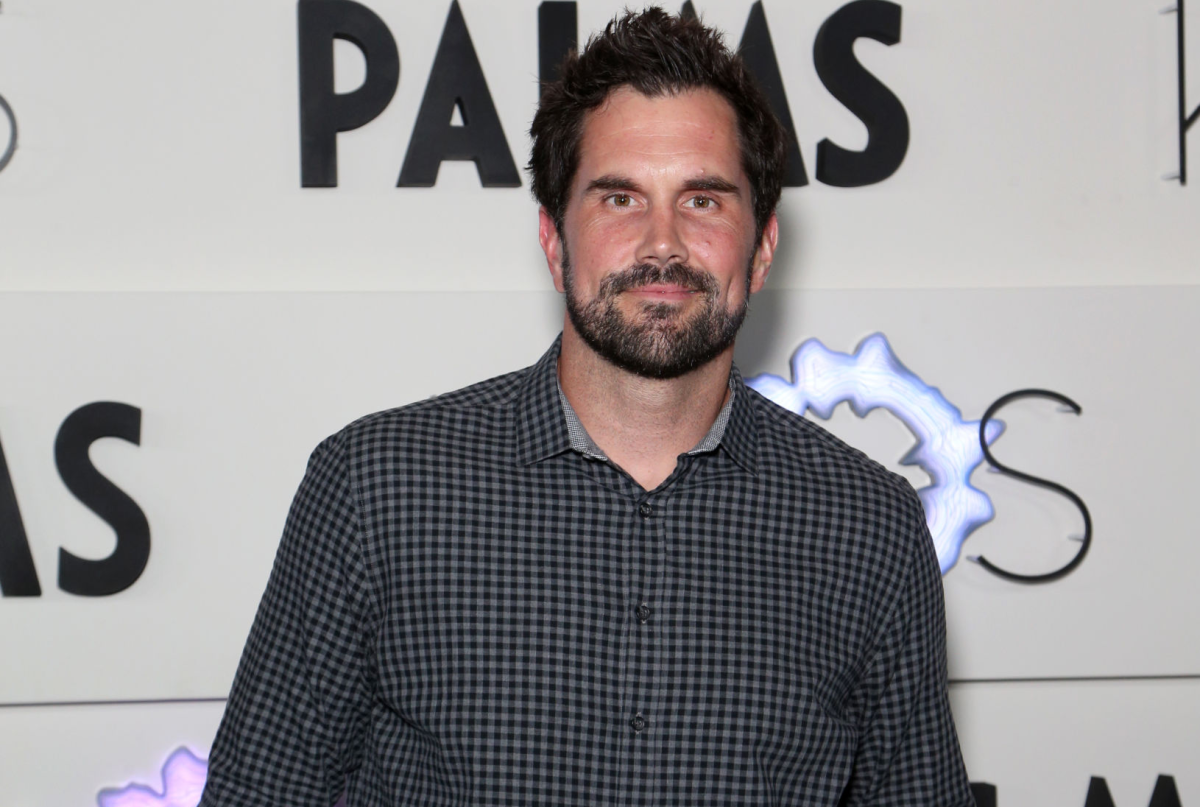 Matt Leinart stands, hands in pockets, in front of a sign at Palms Casino Resort on April 5, 2019, in Las Vegas.