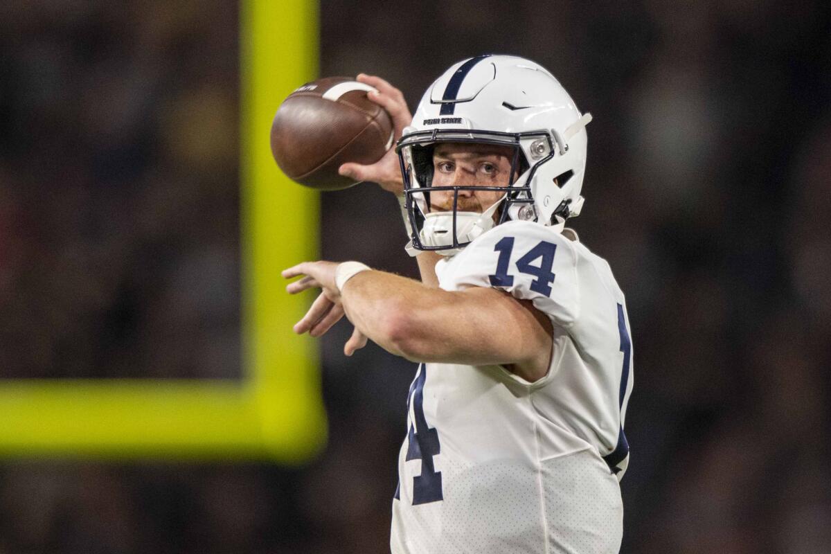 FILE - Penn State quarterback Sean Clifford (14) during an NCAA football game on Thursday, Sept. 1, 2022, in West Lafayette, Ind. Clifford and the Nittany Lions host Ohio in Penn State's home opener on Saturday. (AP Photo/Doug McSchooler, File)