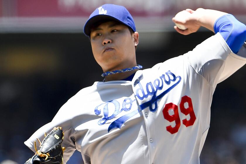 Dodgers starter Hyun-Jin Ryu delivers a pitch during Sunday's win over the San Diego Padres.