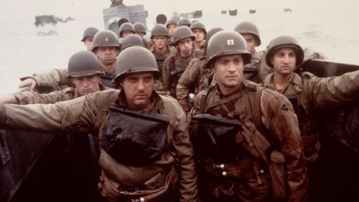 Tom Hanks, right, and Tom Sizemore, left, appear in a scene from the movie "Saving Private Ryan."