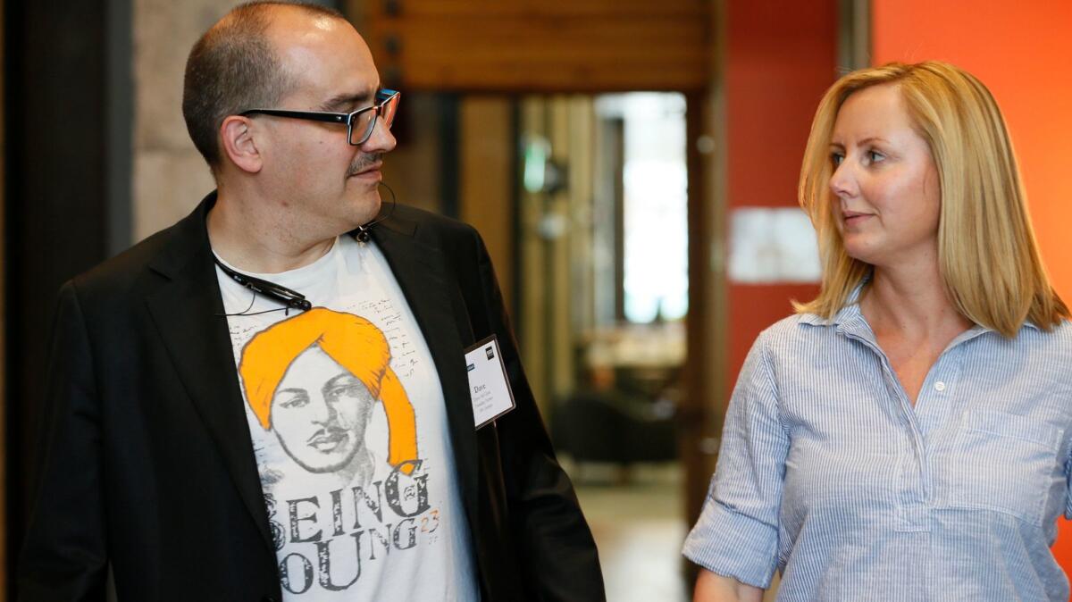 Dave McClure, left, founder of business incubator 500 Startups, is going through counseling after inappropriate conduct around women, according to his firm. Above, McClure with Claire Lee of Silicon Valley Bank in 2015.