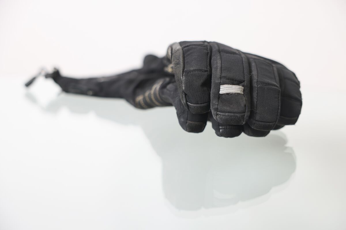 A sturdy-looking black glove