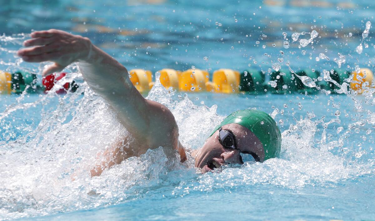 Alexander Smedley of Edison swims to victory in the boys' 200 free during the Wave League swim finals Thursday.