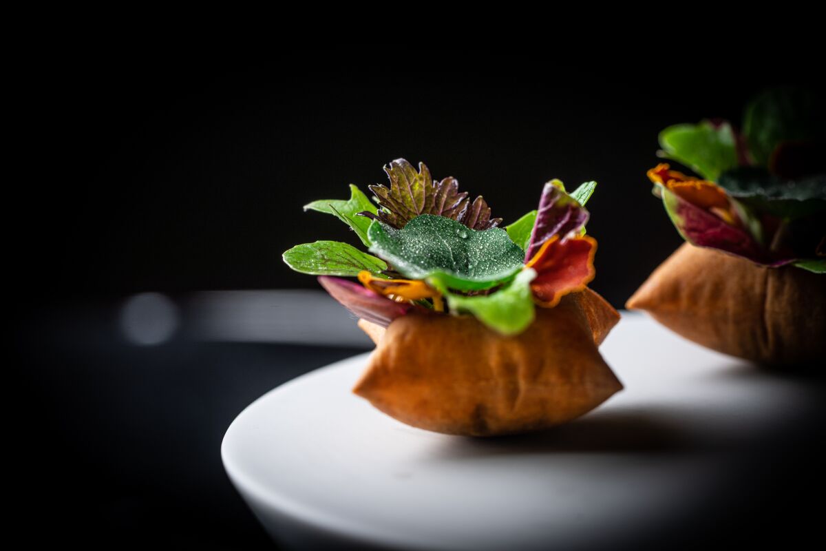 The Sage Hill Ranch garden greens appetizer course at Addison Restaurant.