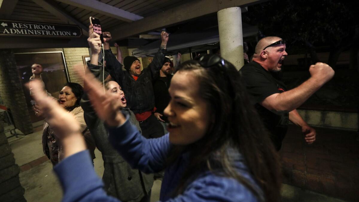 Spectators cheer as the Los Alamitos City Council votes to oppose California's sanctuary state law. (Robert Gauthier/Los Angeles Times)