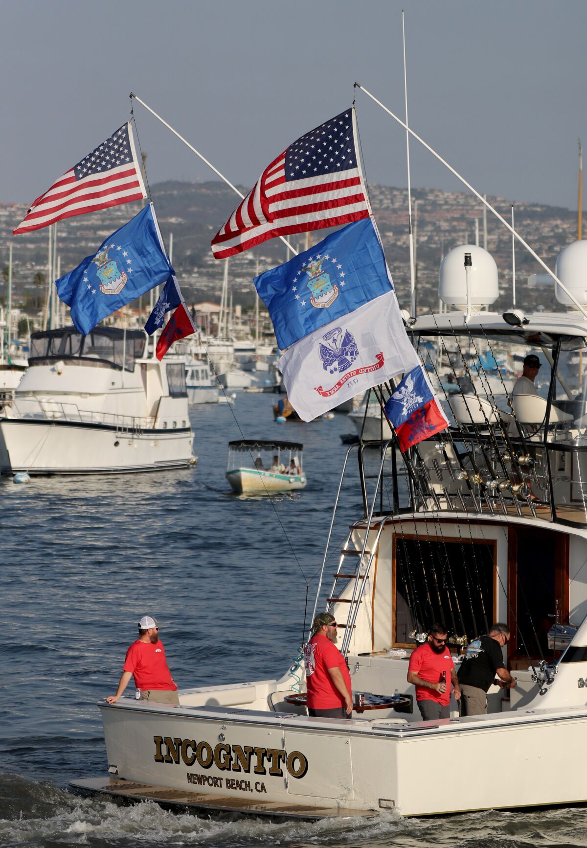 Participating boats are decorated with a variety of flags.