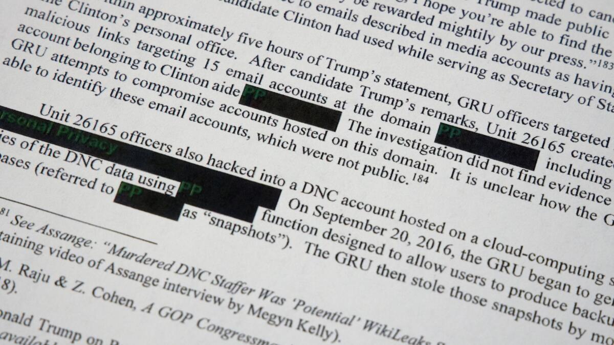 Special counsel Robert S. Mueller III's redacted report on the investigation into Russian interference in the 2016 presidential election is photographed on April 18.