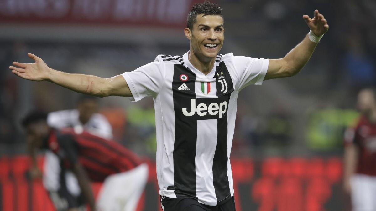 Juventus striker Cristiano Ronaldo celebrates after he scored a goal against AC Milan on Nov. 11.