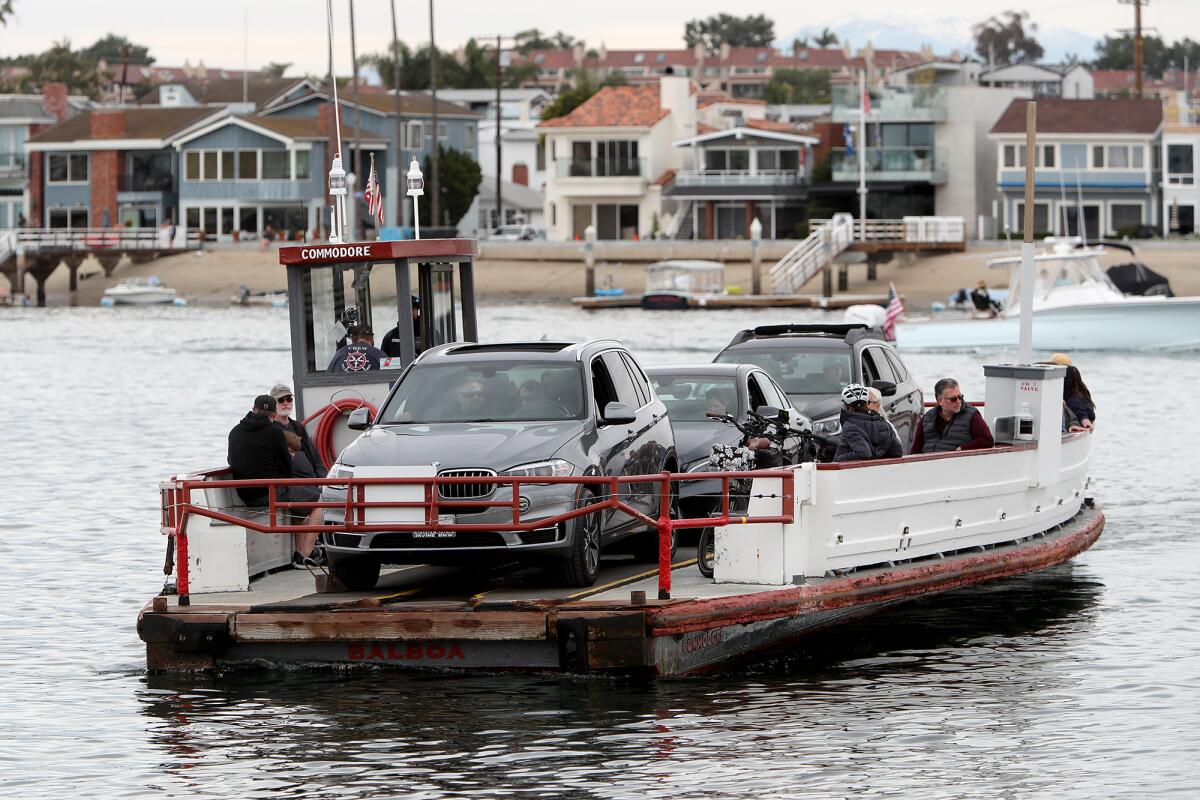 The Balboa Island Ferry transports vehicles and pedestrians from Balboa Island to Balboa Peninsula on Saturday.