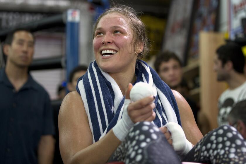Ronda Rousey works out at Glendale Fighting Club back in July.