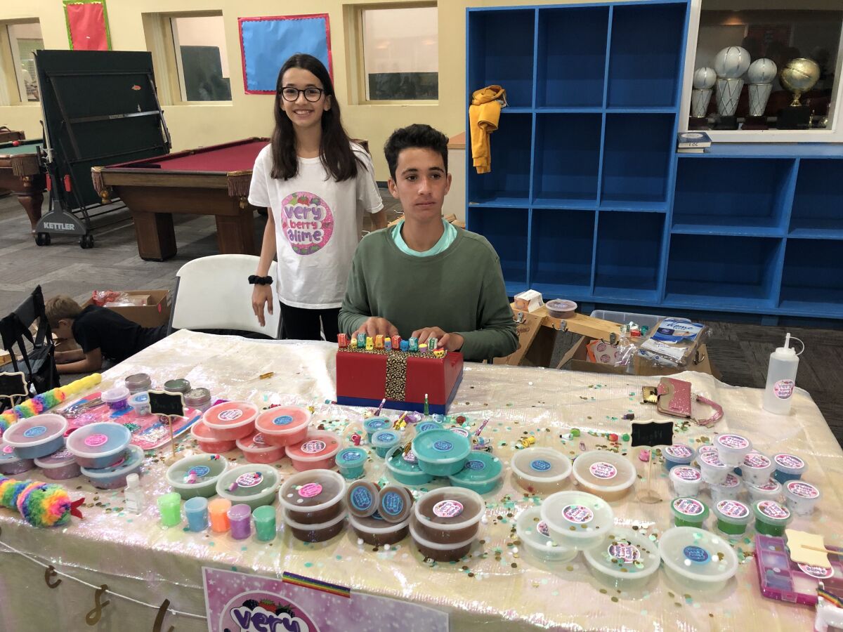 Mia Saban and her Very Berry Slime creations at her charity slime event in Carmel Valley.