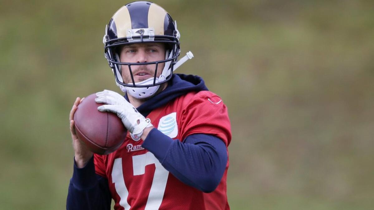 Rams quarterback Case Keenum takes part in a team practice session at Pennyhill Park Hotel in Bagshot, England, on Friday.