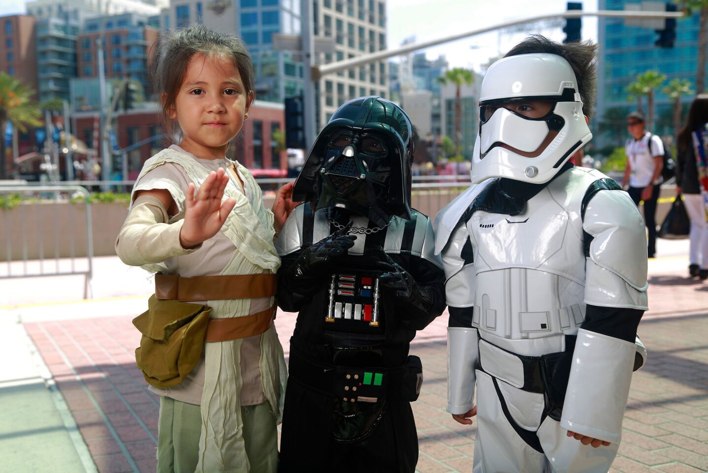 Siblings Itzel Becerra, left, Uriel Becerra and Elfego Becerra dressed as Rey, Darth Vader and a Stormtrooper from "Star Wars" at Comic-Con in San Diego on July 20.