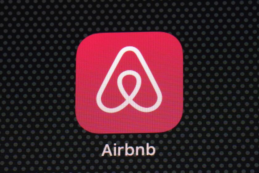 The Airbnb app icon is displayed on an iPad screen in Washington, D.C., on May 8, 2021. 