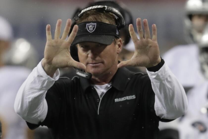 Oakland Raiders head coach Jon Gruden gestures on the sideline during the first half of an NFL football preseason game against the Seattle Seahawks, Thursday, Aug. 29, 2019, in Seattle. (AP Photo/Stephen Brashear)