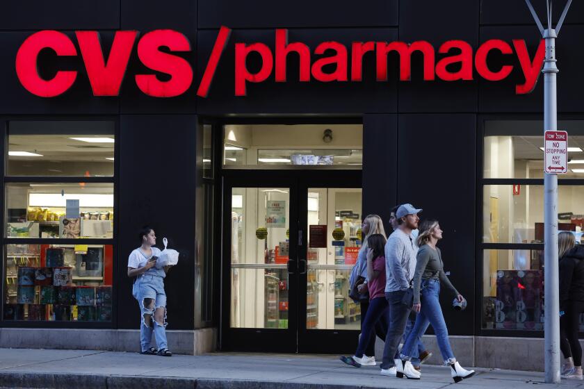A CVS Pharmacy store is seen, Friday, Nov 4, 2022, in Boston. (AP Photo/Michael Dwyer)