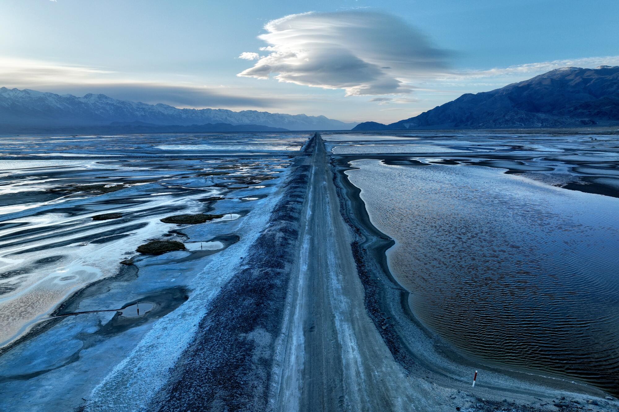 An aerial frame of pools of water in Owens Lake  during a 'blue hour' after sunset.