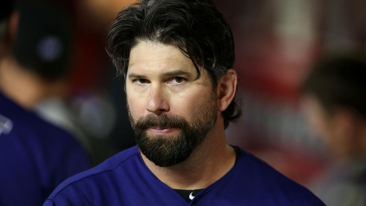 As Rockies retire Todd Helton's number, his high school coach