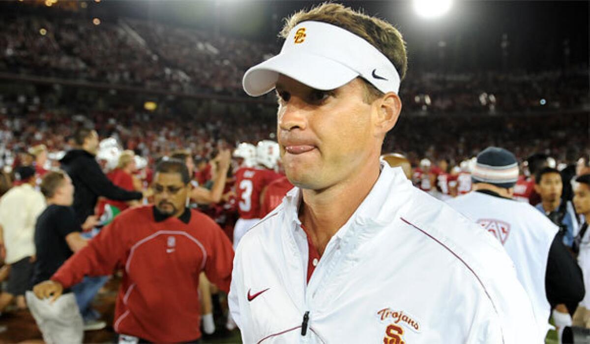 USC Coach Lane Kiffin suspended a beat writer for reporting that a Trojans kicker had undergone surgery. The coach later apologized.