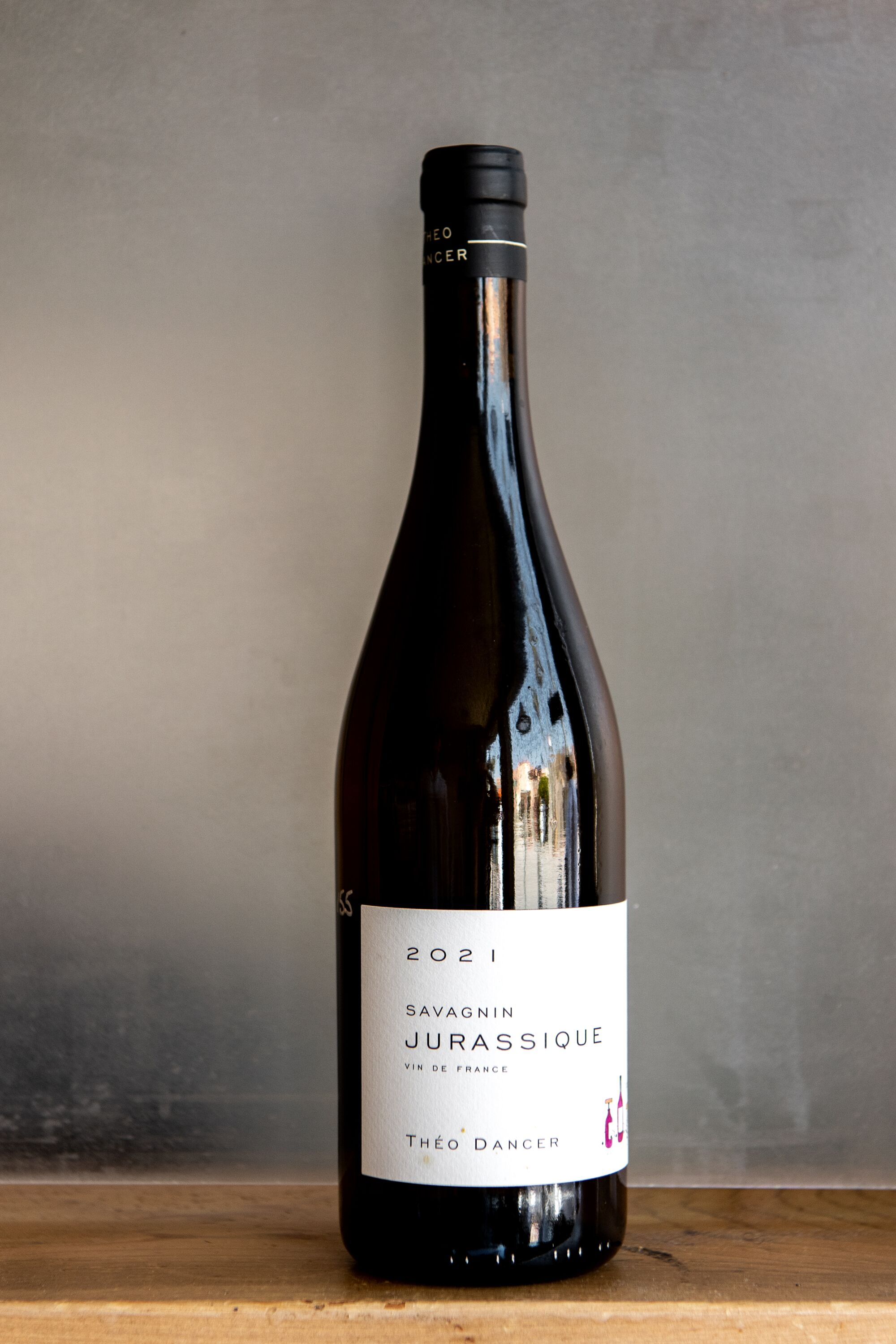 A bottle of wine on a table