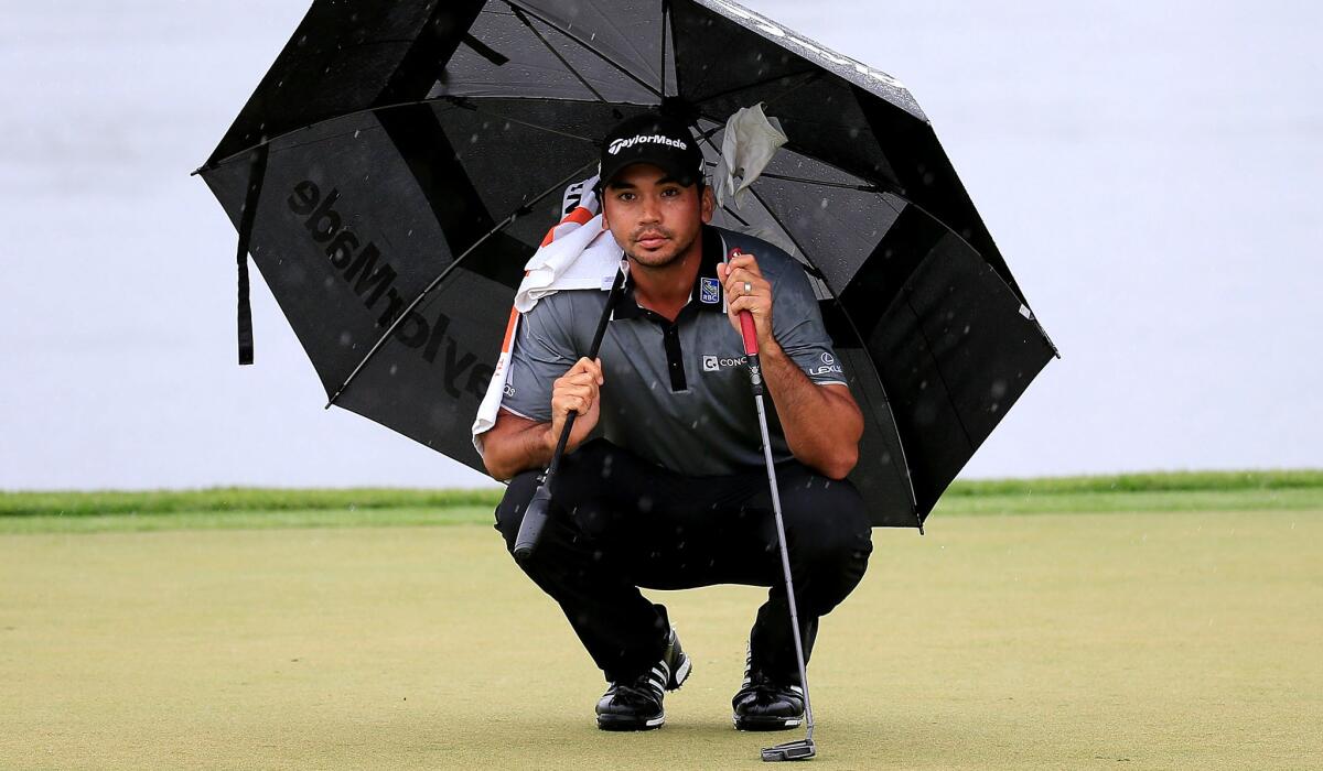 Jason Day lines up a putt on the 11th green Saturday during the third round of the Arnold Palmer Invitational.