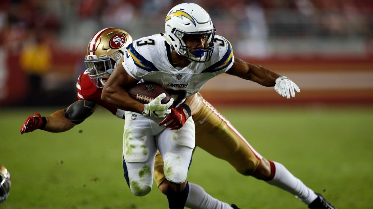 Chargers running back Austin Ekeler (3) runs against the San Francisco 49ers during the second half of a preseason game on Thursday in Santa Clara.