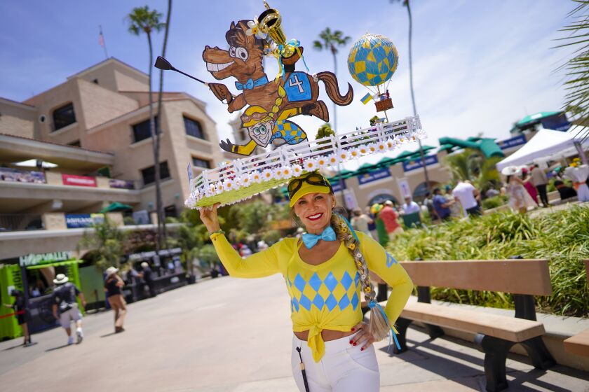Del Mar, CA - July 22: Steffi Pace from Park City was among the race fans taking part in the tradition of wearing hats on opening day at Del Mar Thoroughbred Club on Friday, July 22, 2022 in Del Mar, CA. (Nelvin C. Cepeda / The San Diego Union-Tribune)