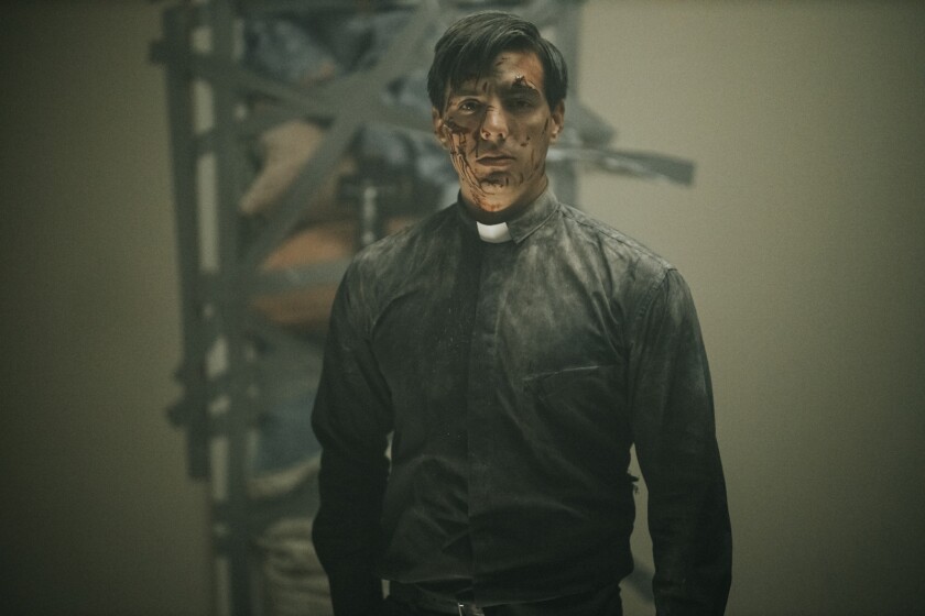 Vadhir Derbez as a beat-up priest in the movie "The Seventh Day."