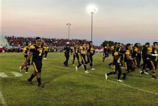 San Pedro players head to the sideline after warming up for their game against Banning.