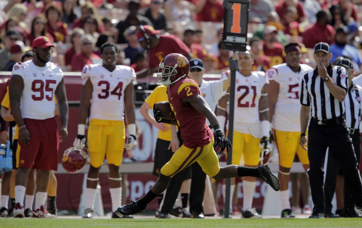 Adoree' Jackson sprints down the sideline after making a reception during USC's annual spring game Saturday at the Coliseum.