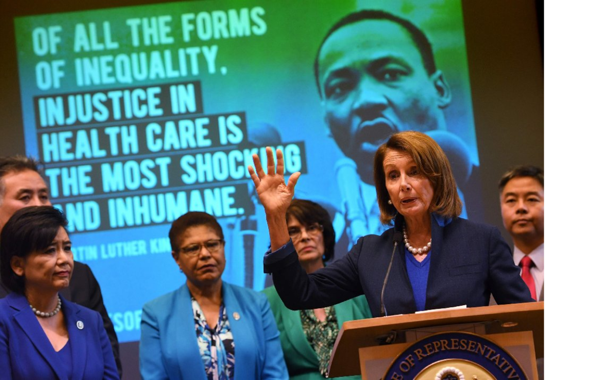 House Minority Leader Nancy Pelosi speaks beside fellow Democrats at a Los Angeles event to protect the Affordable Care Act.
