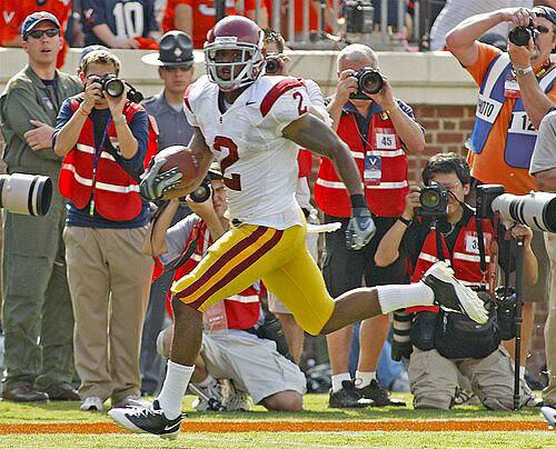 USC tailback C.J. Gable breaks into the clear during a 33-yard touchdown run against Virginia in the first quarter Saturday.
