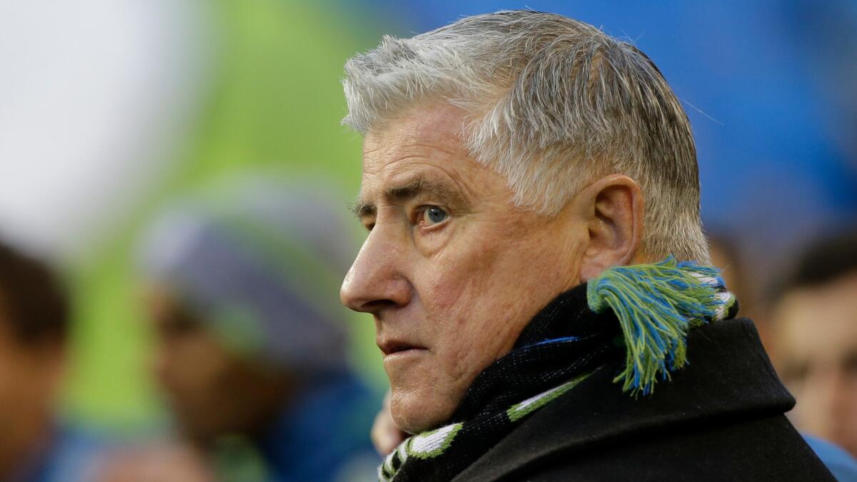 Sigi Schmid awaits the start of a Seattle Sound game on March 8, 2015.