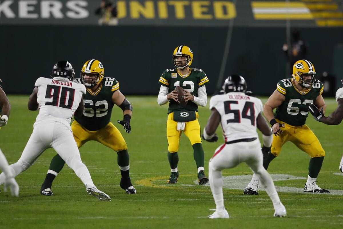 Green Bay Packers quarterback Aaron Rodgers looks to pass against the Atlanta Falcons on Oct. 5.