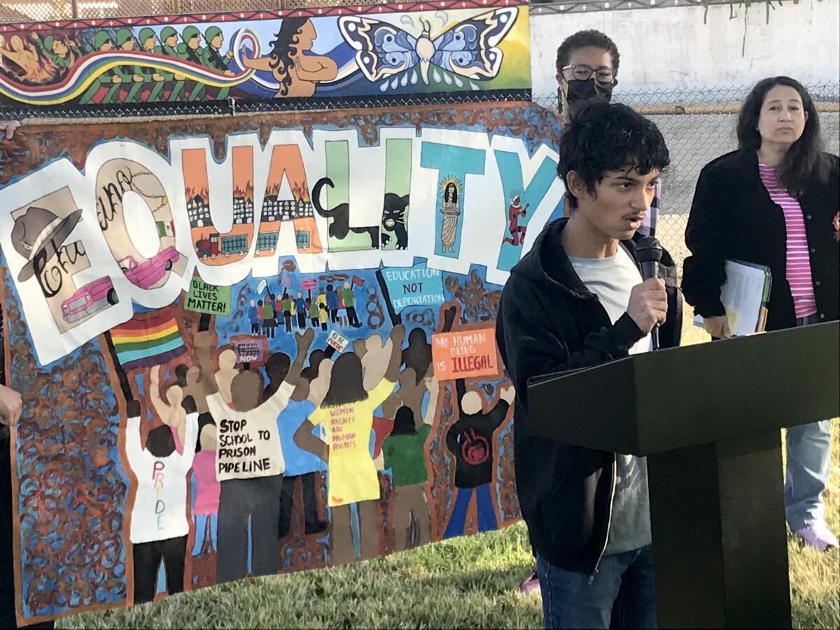 Gabe Estrada, a Placentia-Yorba Linda Unified School District student, speaks at a press conference.