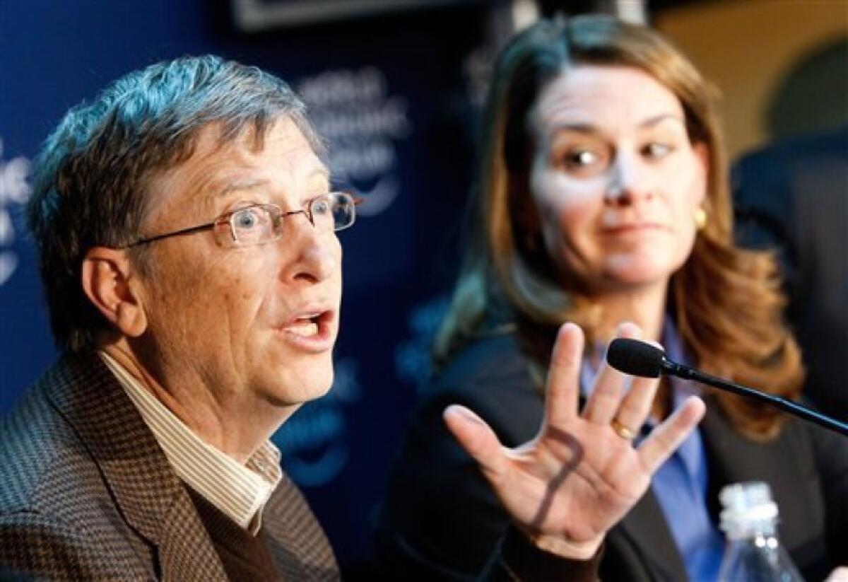 Bill and Melinda Gates at a news conference in Switzerland in 2010